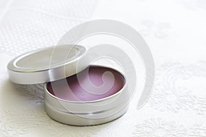 Purple lip balm with beeswax photo