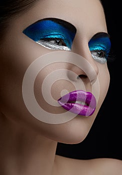 Purple lips, blue shadows on the eyes, black eyebrows Women Makeup Beauty