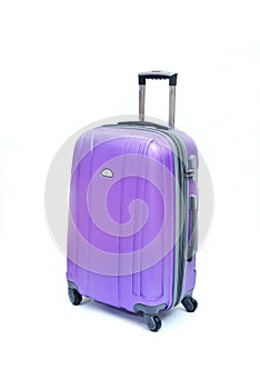 Purple luggage isolated photo