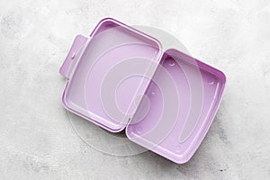 Purple lunch box. Empty container for food, top view