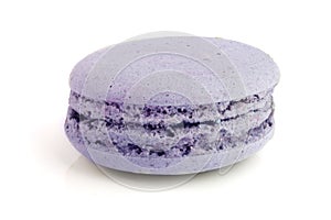 Purple macaroon isolated on white background closeup