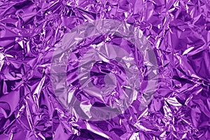 Purple metallic foil shiny texture, wrinkled wrapping paper for background and design art work