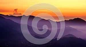 Purple mountain with sunset over Minca in Colombia