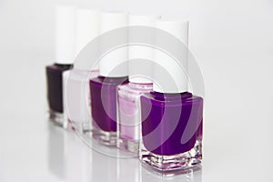 Purple nail Polish in a glass bottle