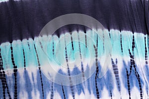 Purple and navy blue tie dye fabric print background