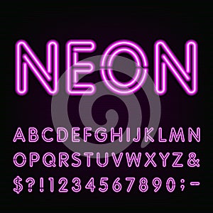 Purple Neon Light Alphabet Font. photo