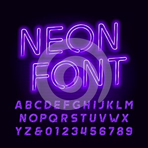 Purple neon tube alphabet font. Neon color oblique letters and numbers. Stock vector typeface.