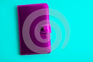 purple notepad on a blue background