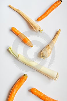 Purple onion, celery and carrot slices isolated on white background. Package design element with clipping path