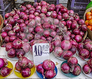 Purple onion for sale at local market