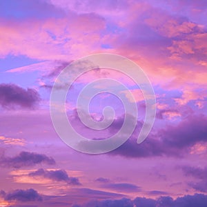 Purple orange pink sunset. Beautiful evening sky with clouds background