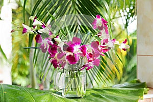 Purple orchid for decorative design. Floral background.