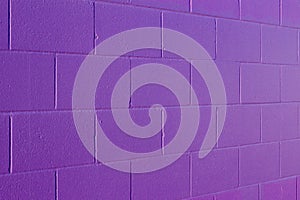 Purple painted cement block wall texture background