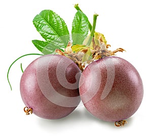 Purple passion fruits or maracuyas isolated on white background