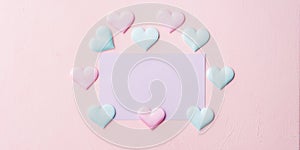 Purple pastel card and hearts on pink banner background