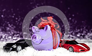 Purple pig with a red bow, miniature cars