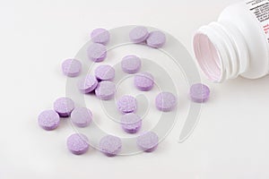 Purple pills medicine bottle