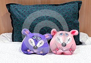 Purple and pink mouses are anti-stress pillows. Symvol of 2020