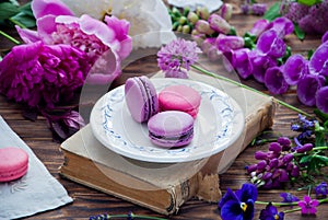Purple and pink various flowers and Purple and pink macaroons