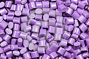 Purple plastic granulate pellets