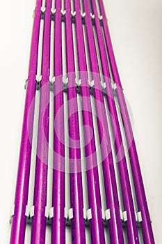 Purple plastic pipes of underfloor heating system