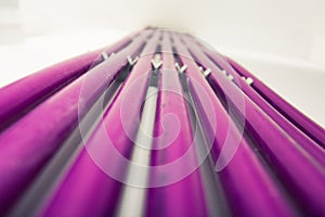 Purple plastic pipes of underfloor heating system