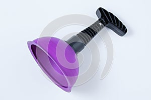 Purple plunger with black handle. White background