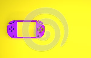 Purple Portable video game console icon isolated on yellow background. Gamepad sign. Gaming concept. Minimalism concept