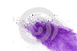 Purple powder explosion on white background. Colored cloud. Colorful dust explode. Paint Holi