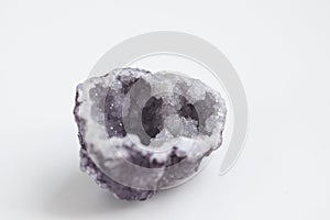 Purple quartz druse or geode mineral stone. Close up photo mineralogy and esotericism. photo