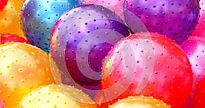 Purple Red Yellow Rubber Bouncy Balls Background