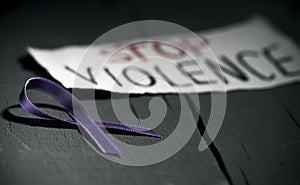 Purple ribbon against the violence against women