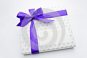 Purple ribbon gift box