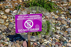 Purple Sign Regarding Recycled Water