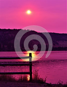 Purple Silhouetted fences in the Montana morning sunrise