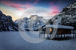 A purple sky over the frozen Lago di Braies, or Pragser Wildsee