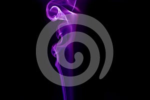 Purple smoke on black background