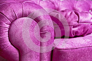 Purple sofa with large rhinestones close-up
