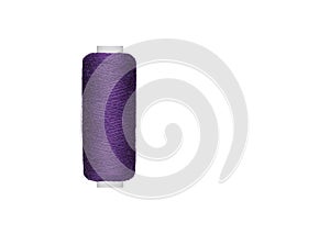 purple spool of sewing thread isolated on white background