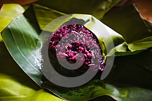Purple sticky rice on banana leaf package