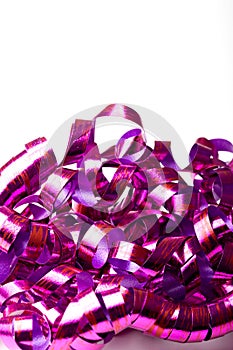 Purple streamers holiday decoration background