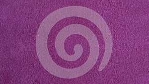 Purple suede leather background with neat texture and copy space, fuzzy leather with a napped finish