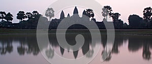 A purple sunrise photo of UNESCO Angkor Wat Temple near Siem Reap in Cambodia
