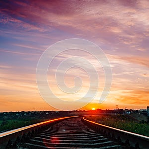 Purple sunset over railroad