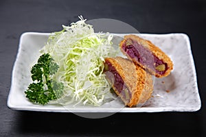 Purple sweet potato croquette on a dining table