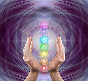 Reiki master offering the seven chakras