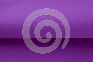 Purple textile background. Close up view of purple fabric texture and background.Abstract background