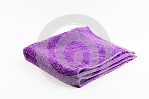 Purple towel handkerchief on white background