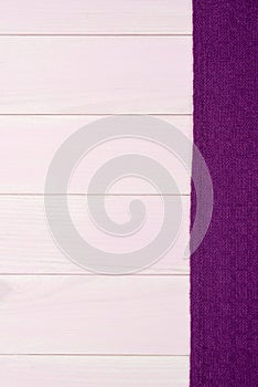 Purple towel over wooden table