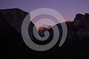 Purple Traces in the Sky as Sunset Fades Over Half Dome